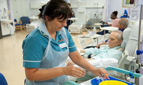 Nurse preparing cancer treatment Nurse preparing cancer treatment